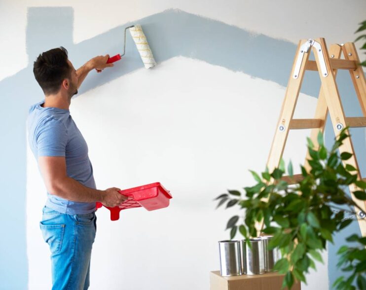 Rear view of man while doing some housework