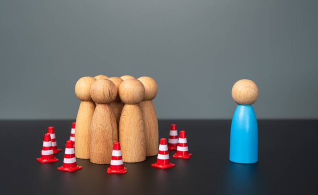 A person is trying to reach an isolated group. To convey his thoughts and visions. Debunking myths and prejudices.