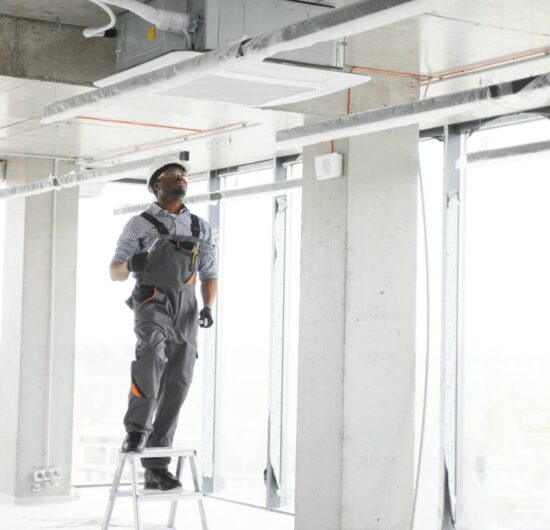 Professional repairman installing Ceilings & Partitions