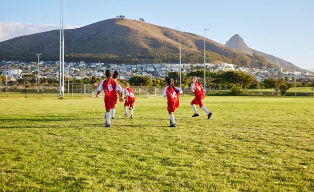 girls-soccer-team-or-fitness-game-on-grass-field-2025-04-06-11-07-35-utc
