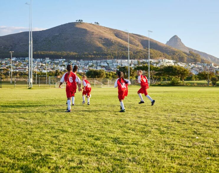 girls-soccer-team-or-fitness-game-on-grass-field-2025-04-06-11-07-35-utc